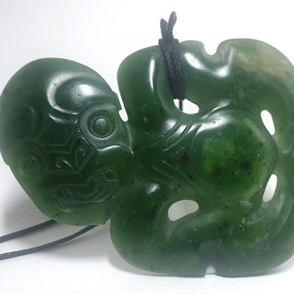 Greenstone tiki pendant by Al Brown