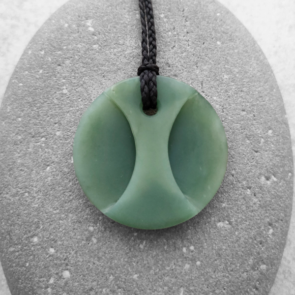 NZ Greenstone taurus disc pendant