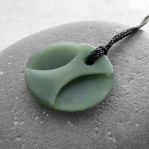 NZ Greenstone taurus disc pendant