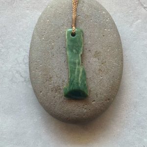 NZ greenstone toki or adze pendant