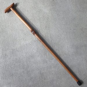 Walking stick carved from New Zealand maire wood by Johnny Hauraki