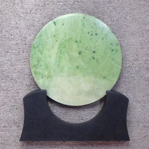 Large NZ greenstone kopae or disc by Raegan Bregmen